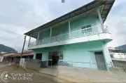 Imóvel de dois pavimentos, com área total de 540,00m², na localidade de Ilhota, Município de Pedras Grandes/SC
